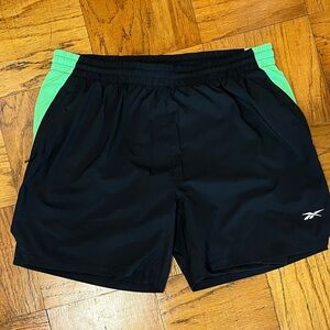 Reebok Lined Athletic Shorts in Black with Green Panels
